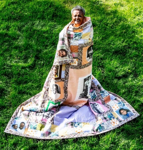 Jaon wrapped in quilt